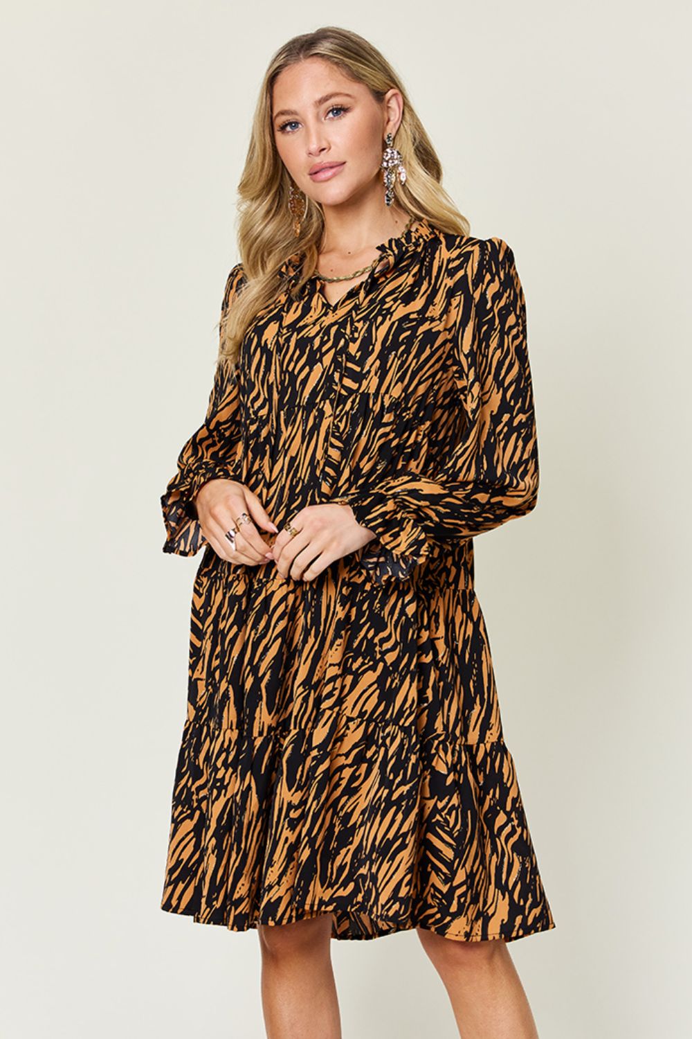 Living the Life Full Size Printed Ruffle Hem Long Sleeve Dress