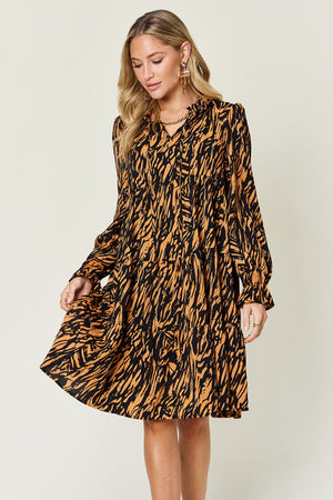 Living the Life Full Size Printed Ruffle Hem Long Sleeve Dress