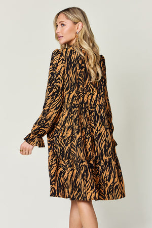 Living the Life Full Size Printed Ruffle Hem Long Sleeve Dress